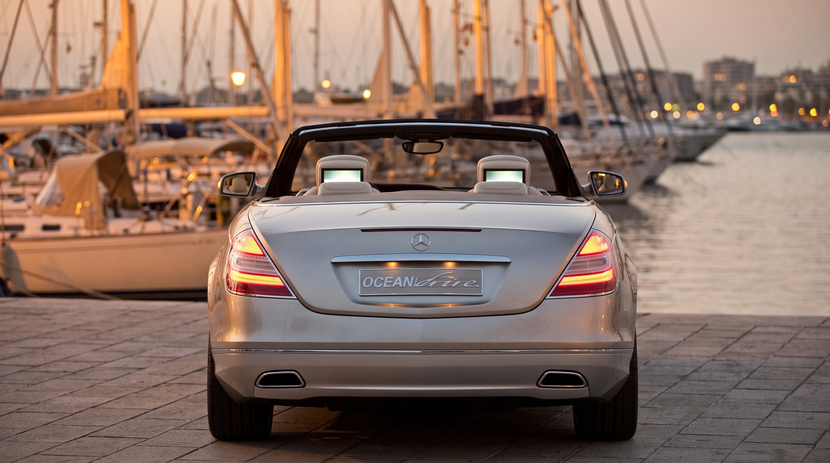Rear view of the Ocean Drive on a marina quay, chrome trunk trim reading OCEAN drive