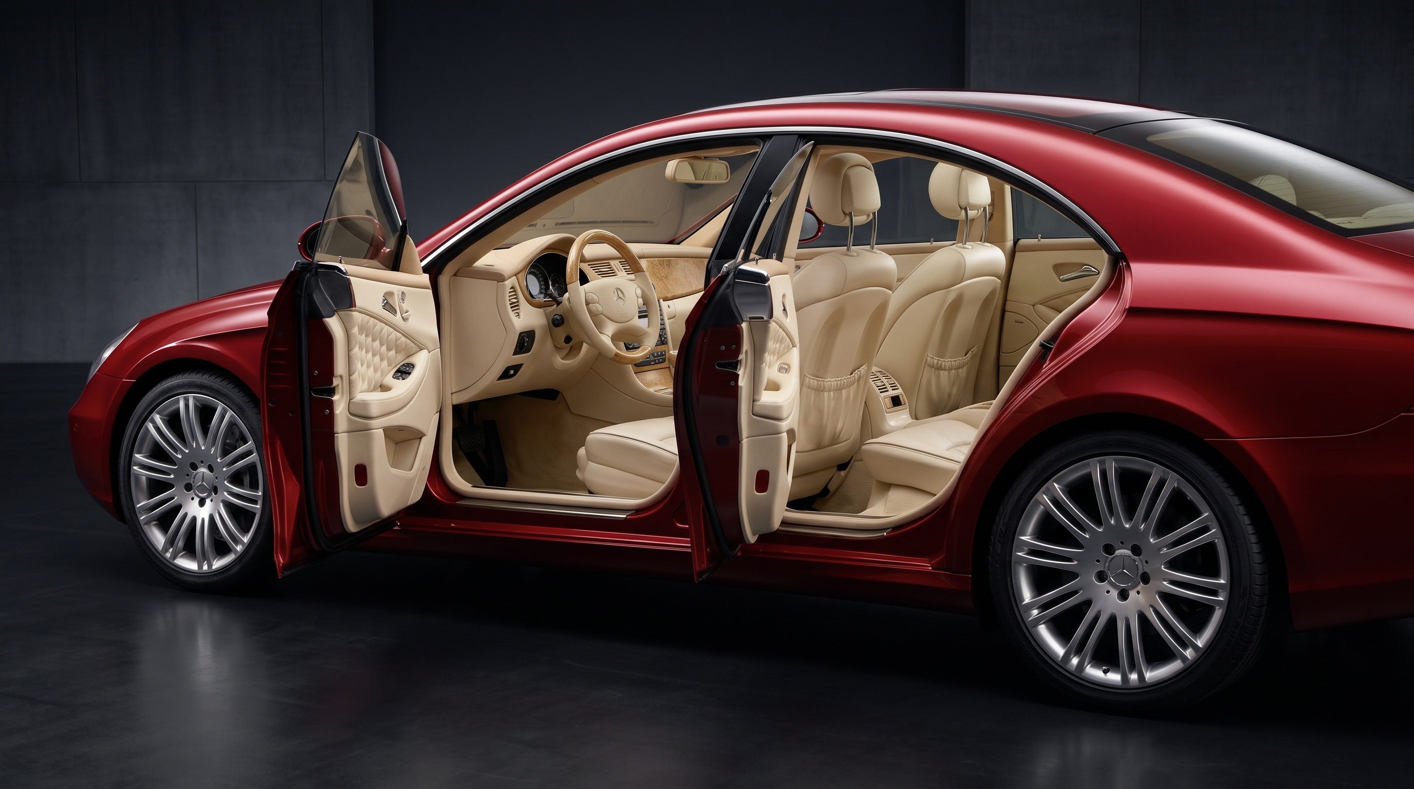 Vision CLS with both side doors open, showing cream quilted interior