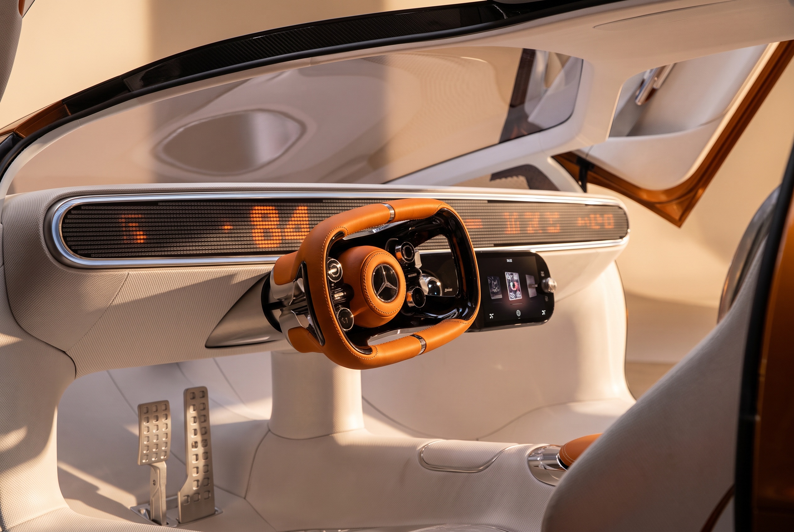 Vision One-Eleven cockpit: orange leather steering wheel, pixel display band, aluminum pedals