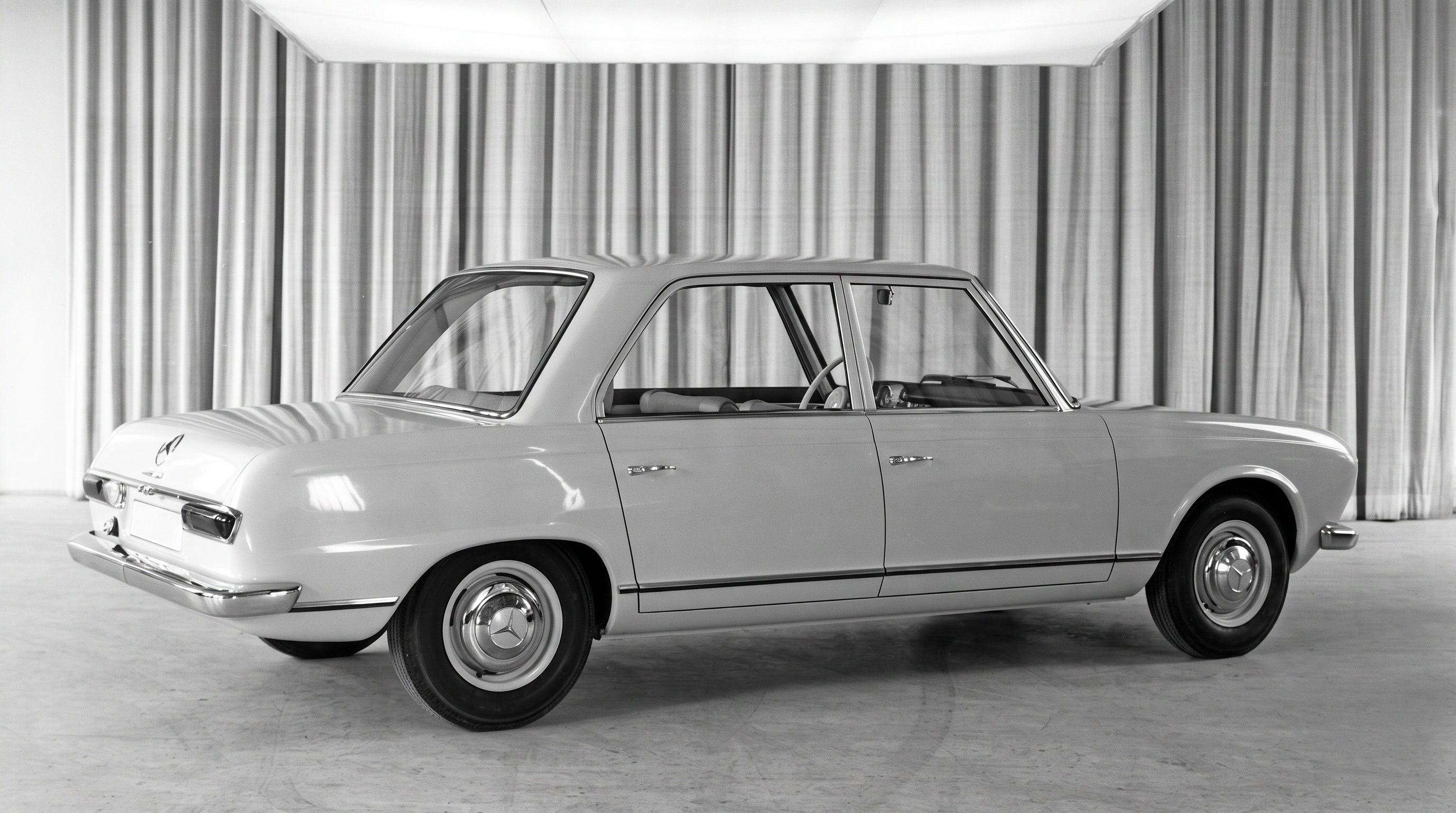 W118 rear three-quarter view